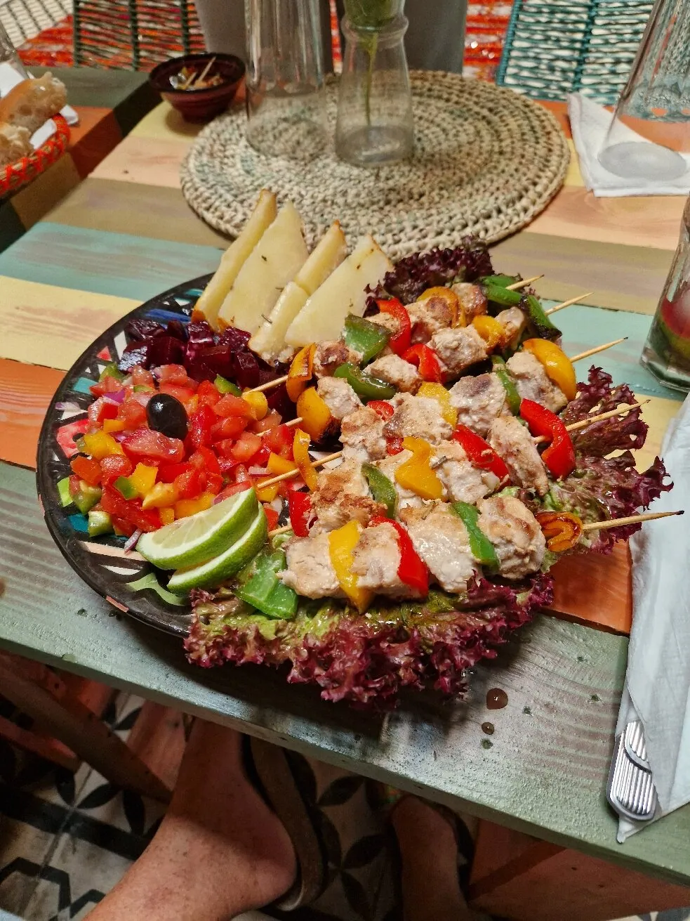 Colourful mixed grill platter with salads